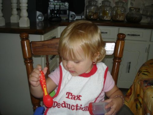 2009 Aug 9 Becca eating Apple Sauce.jpg