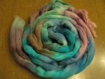 Teal, pink, and green unspun fiber thumbnail.