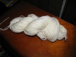 Undyed spun and plied yarn thumbnail.