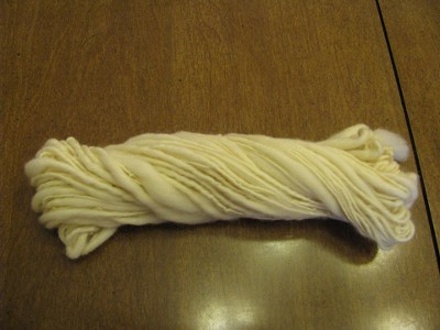 Undyed spun yarn.