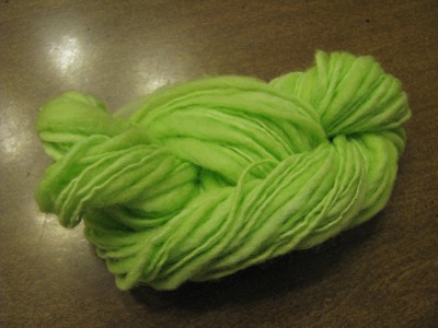 Bright green spun yarn.